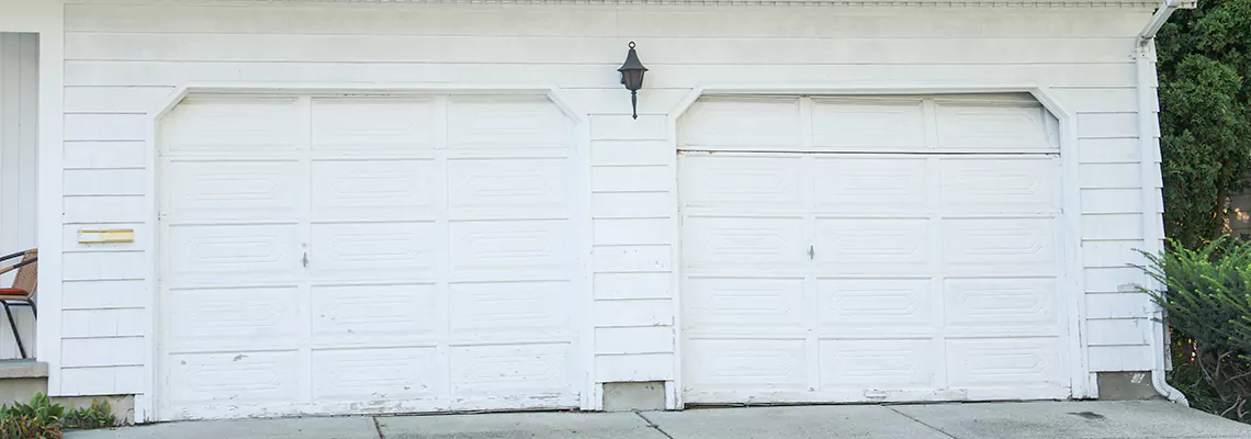 Roller Garage Door Dropped Down Replacement in Miami